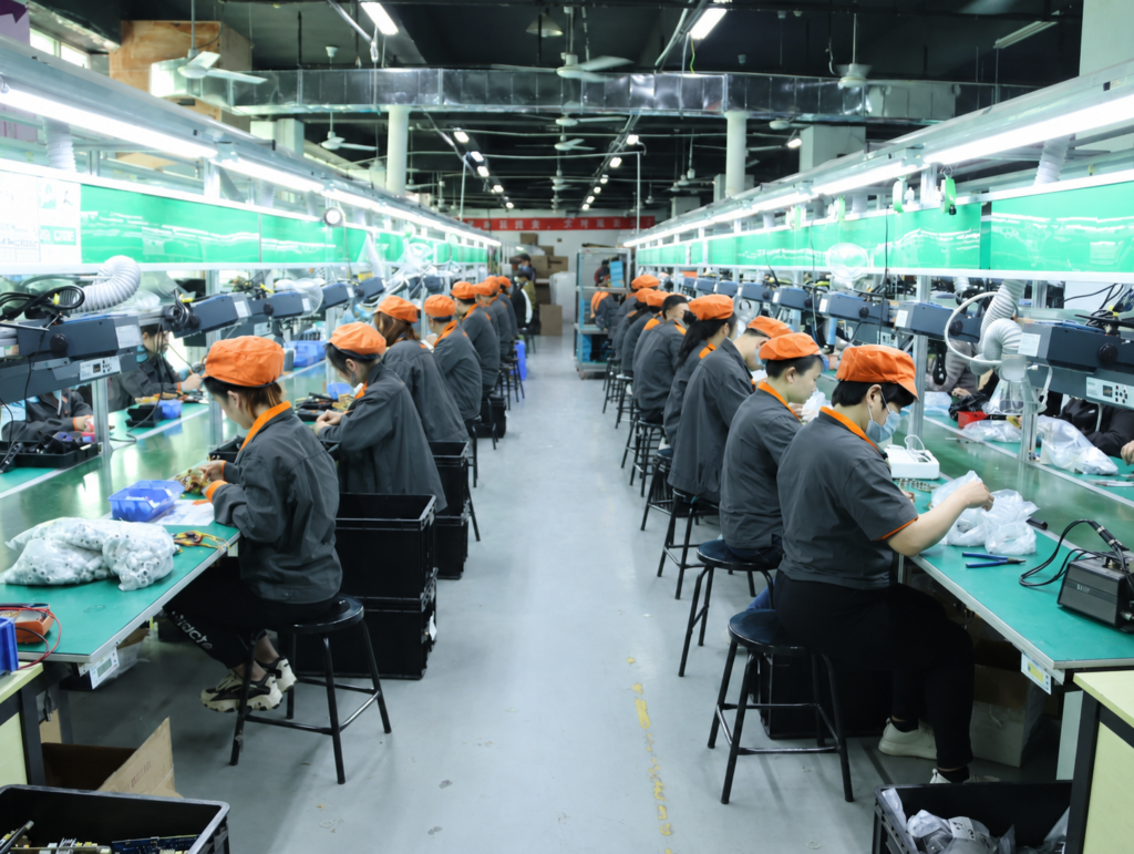 Assembly line in electronics factory workspace
